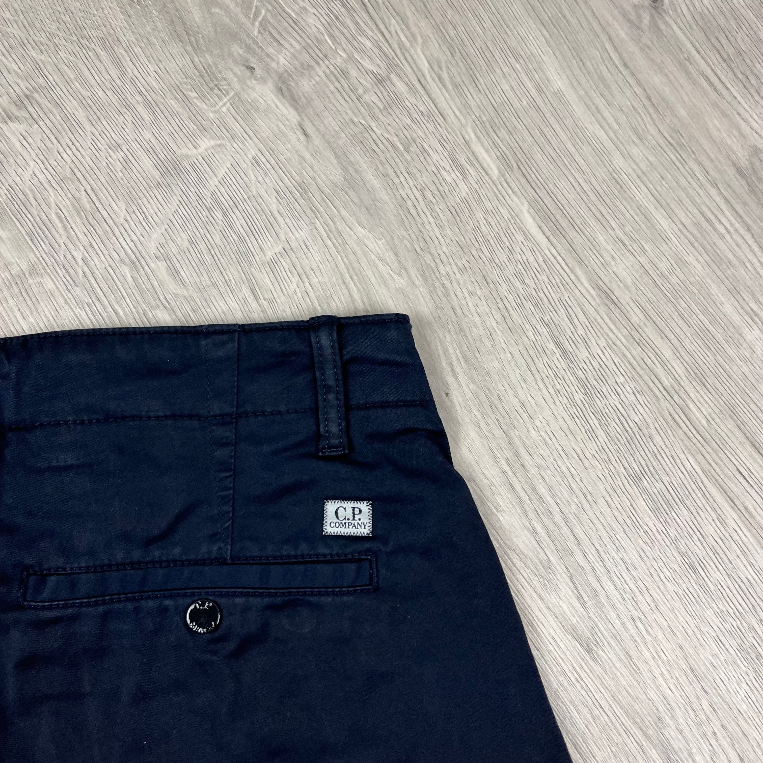 CP Company Stretch Sateen Cargo Shorts in Total Eclipse. On sale at Open Attire.