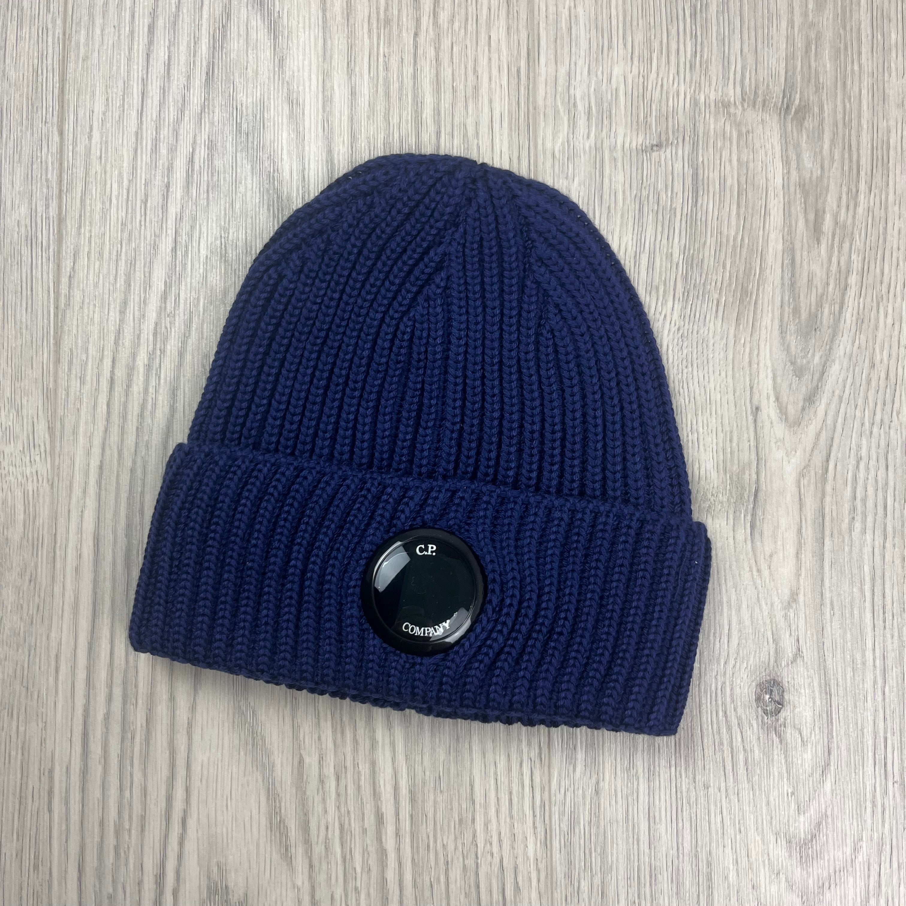 CP Company Merino Wool Lens Beanie in Estate Blue. On sale at Open Attire.