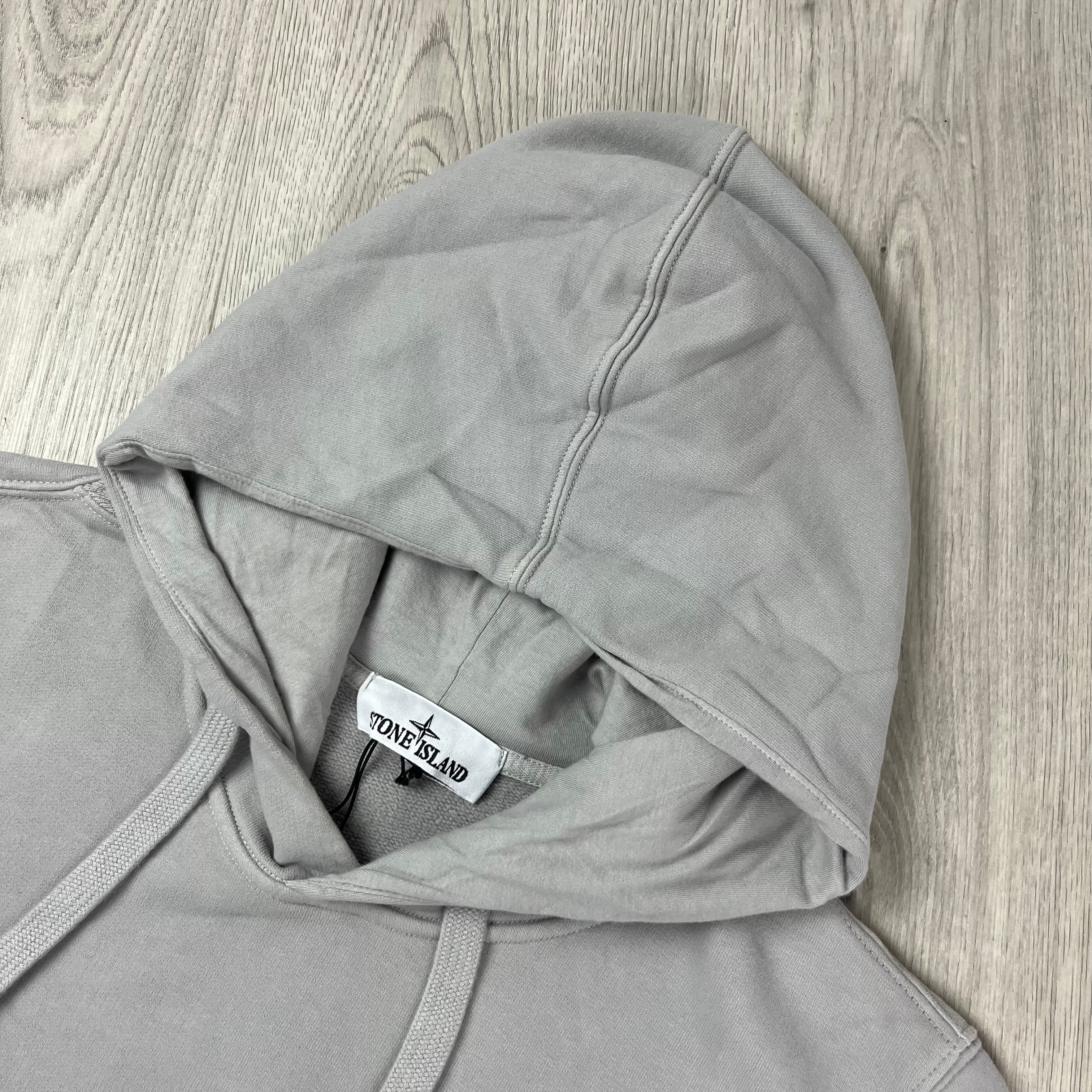 Stone Island hoodie in Grey. On sale at Open Attire.