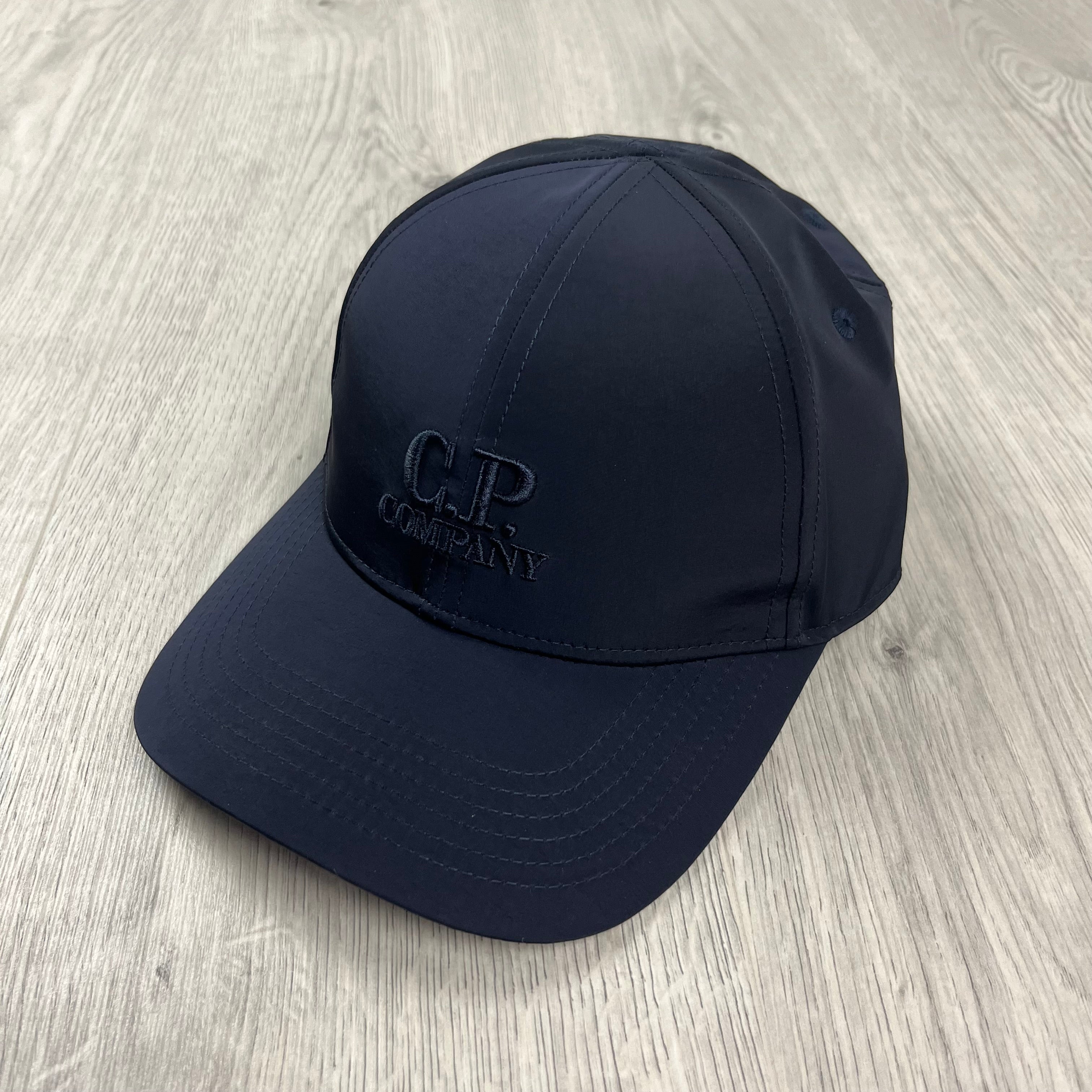 CP Company Chrome-R Baseball Cap in Total Eclipse Navy Blue. On sale at Open Attire.