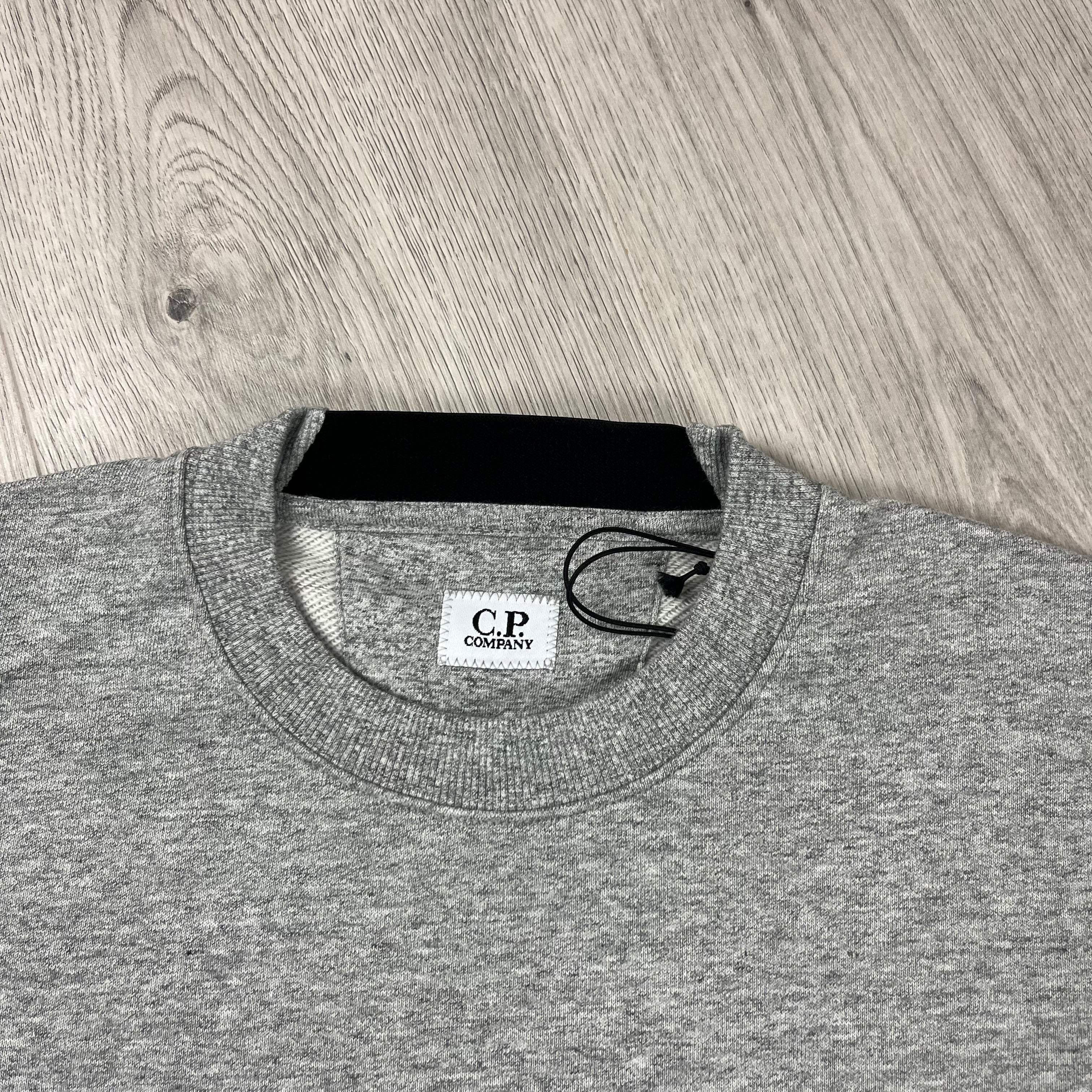 CP Company Raised Fleece Sweatshirt in Greystone Melange. On sale at Open Attire.