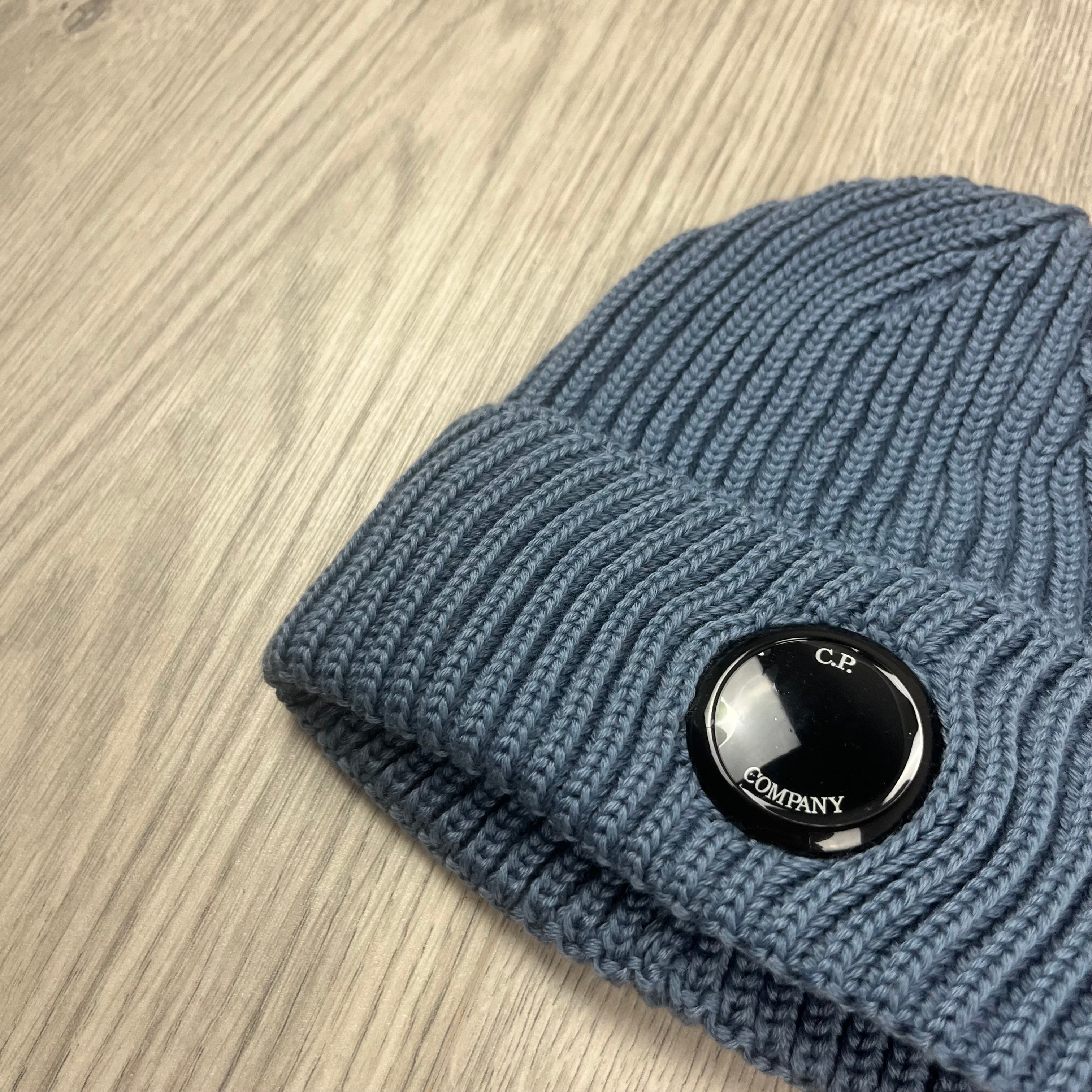 CP Company Merino Wool Lens Beanie in Flint Stone Blue. On sale at Open Attire.