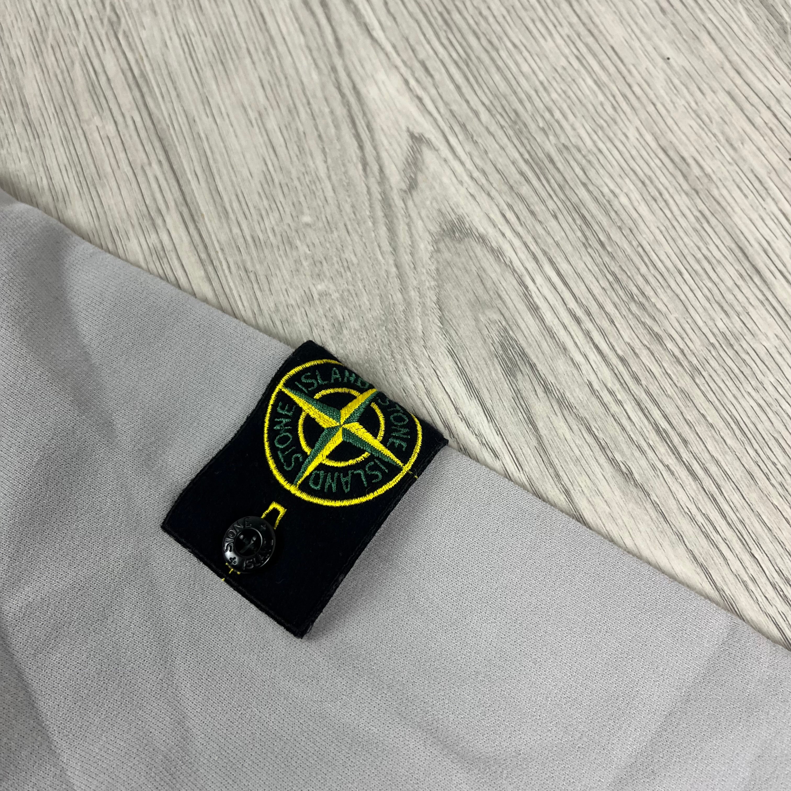 Stone Island hoodie in Grey. On sale at Open Attire.