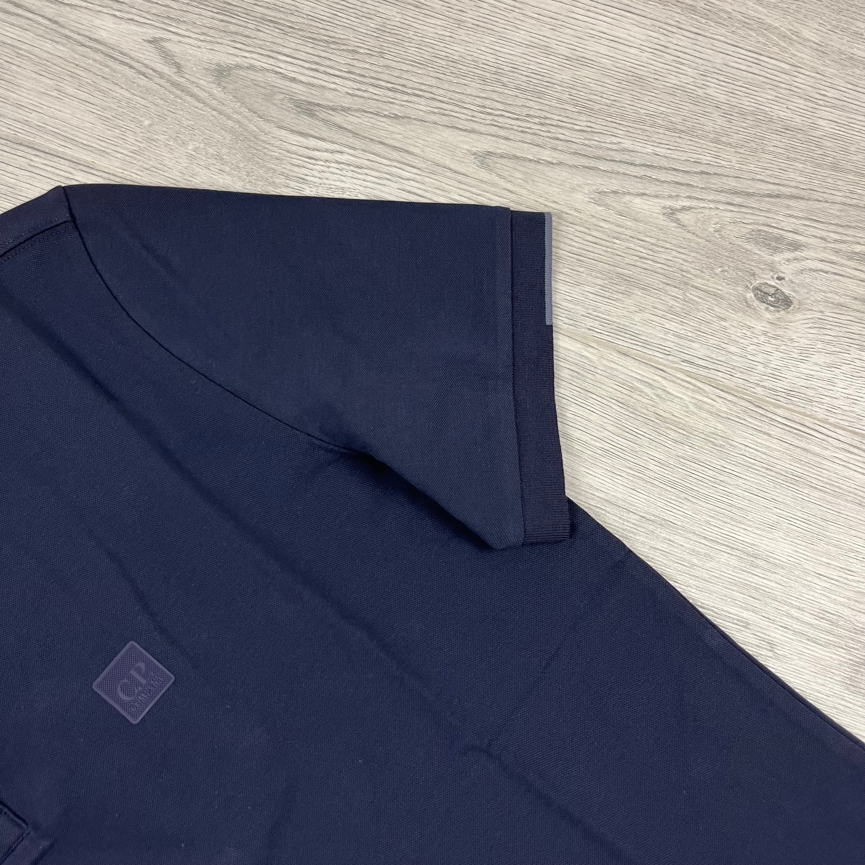 CP Company Metropolis Polo Shirt in Sky Captain. On sale at Open Attire.