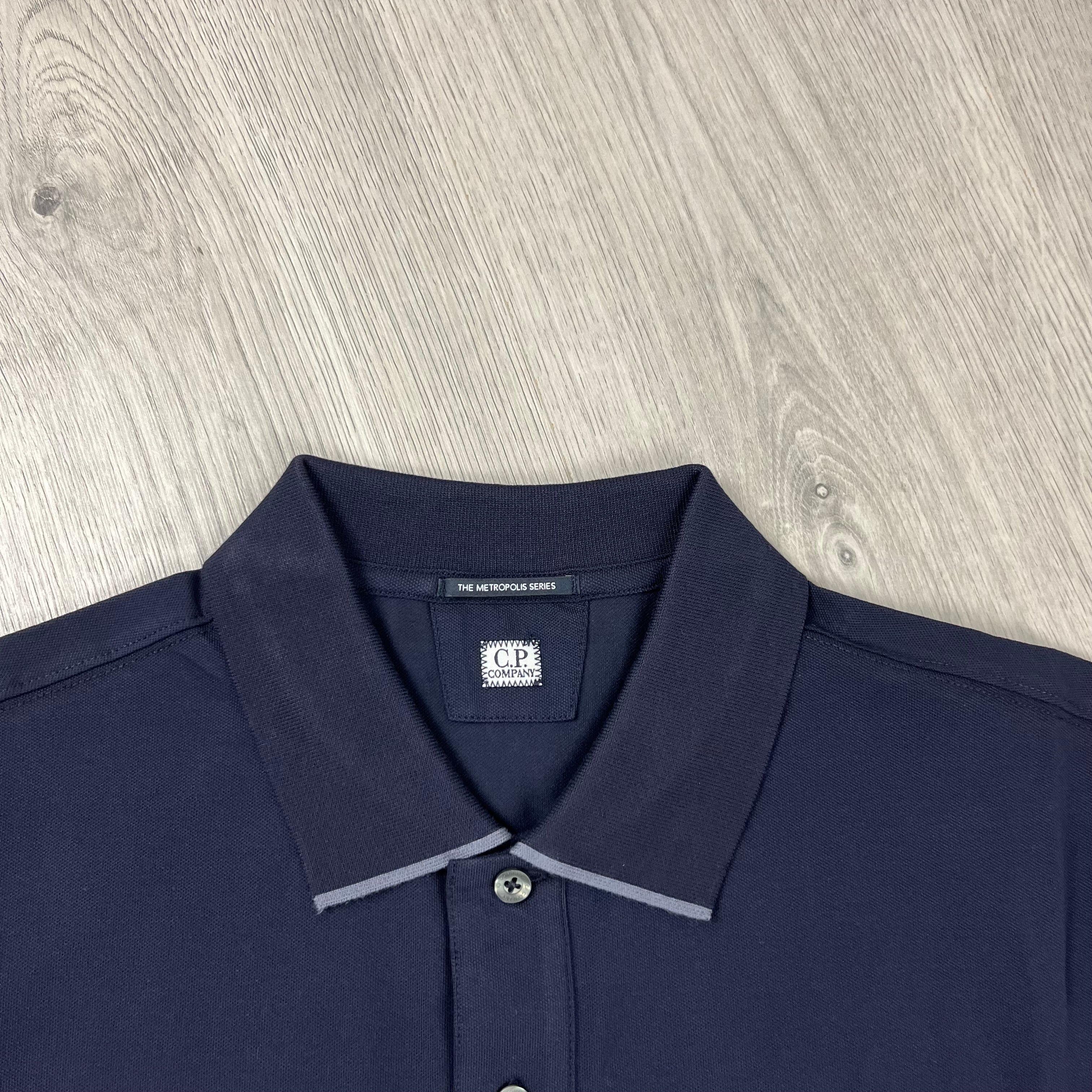 CP Company Metropolis Polo Shirt in Sky Captain. On sale at Open Attire.