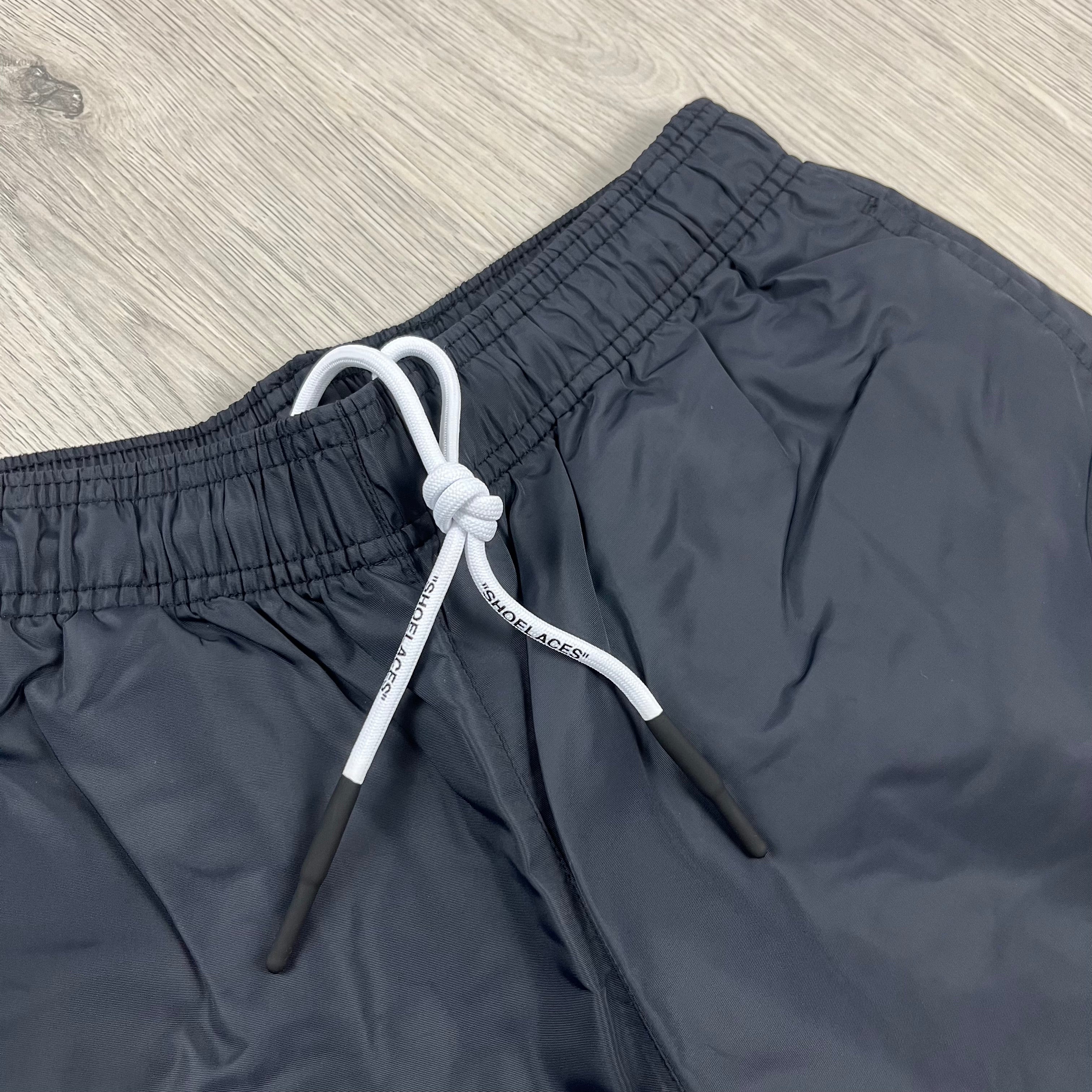 Off-White Swim Shorts in Black. On sale at Open Attire.