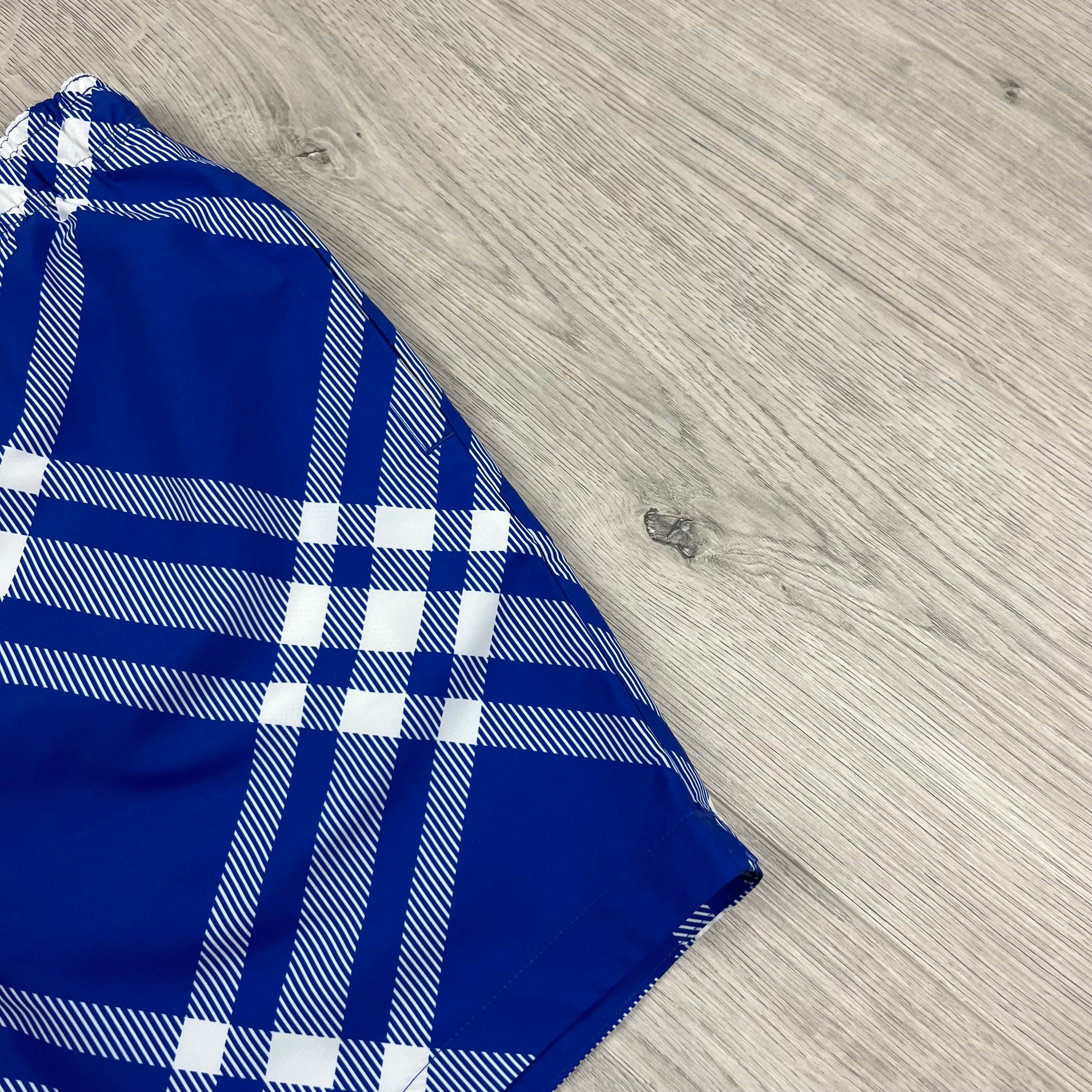 Burberry Check Swim Shorts in Blue. On sale at Open Attire.