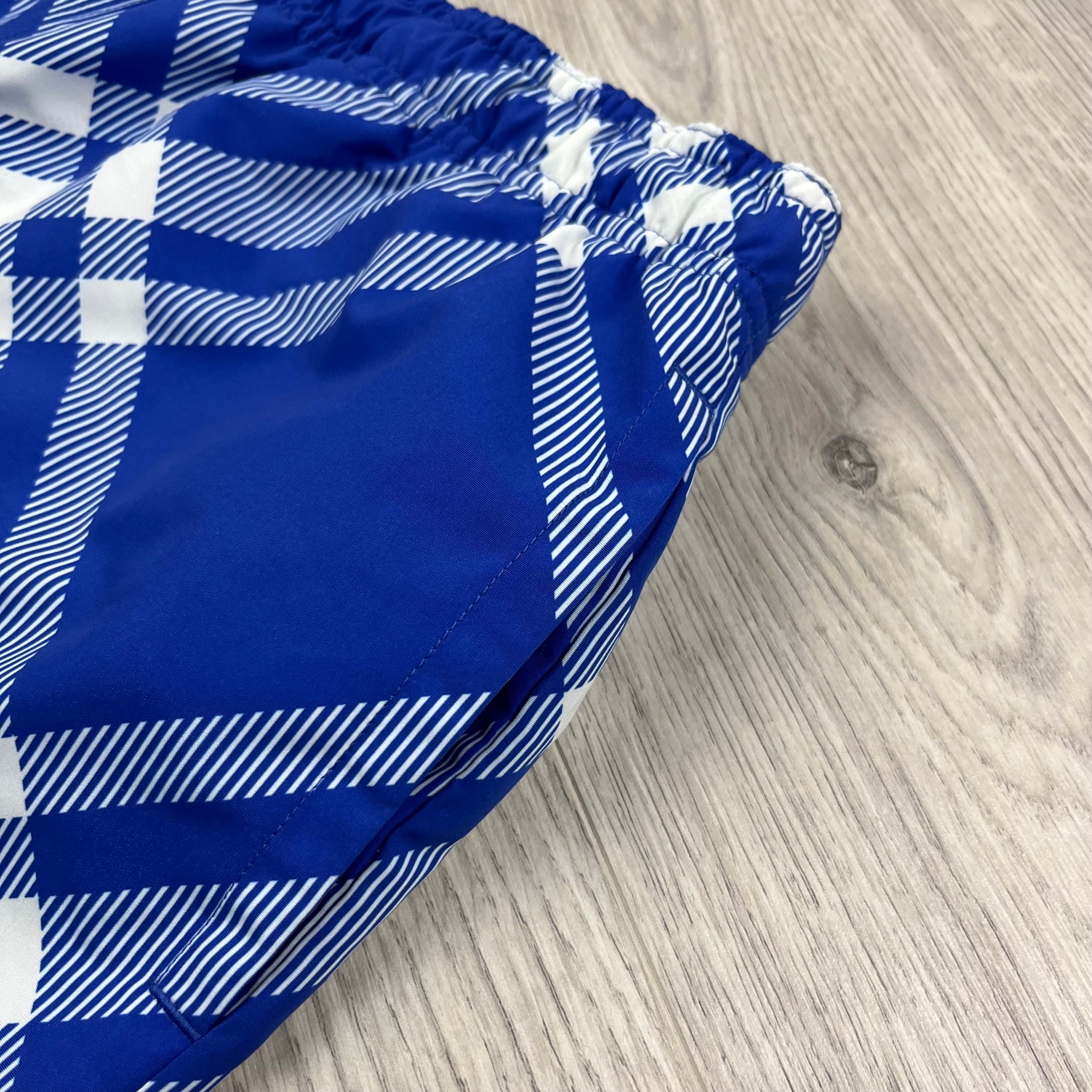 Burberry Check Swim Shorts in Blue. On sale at Open Attire.