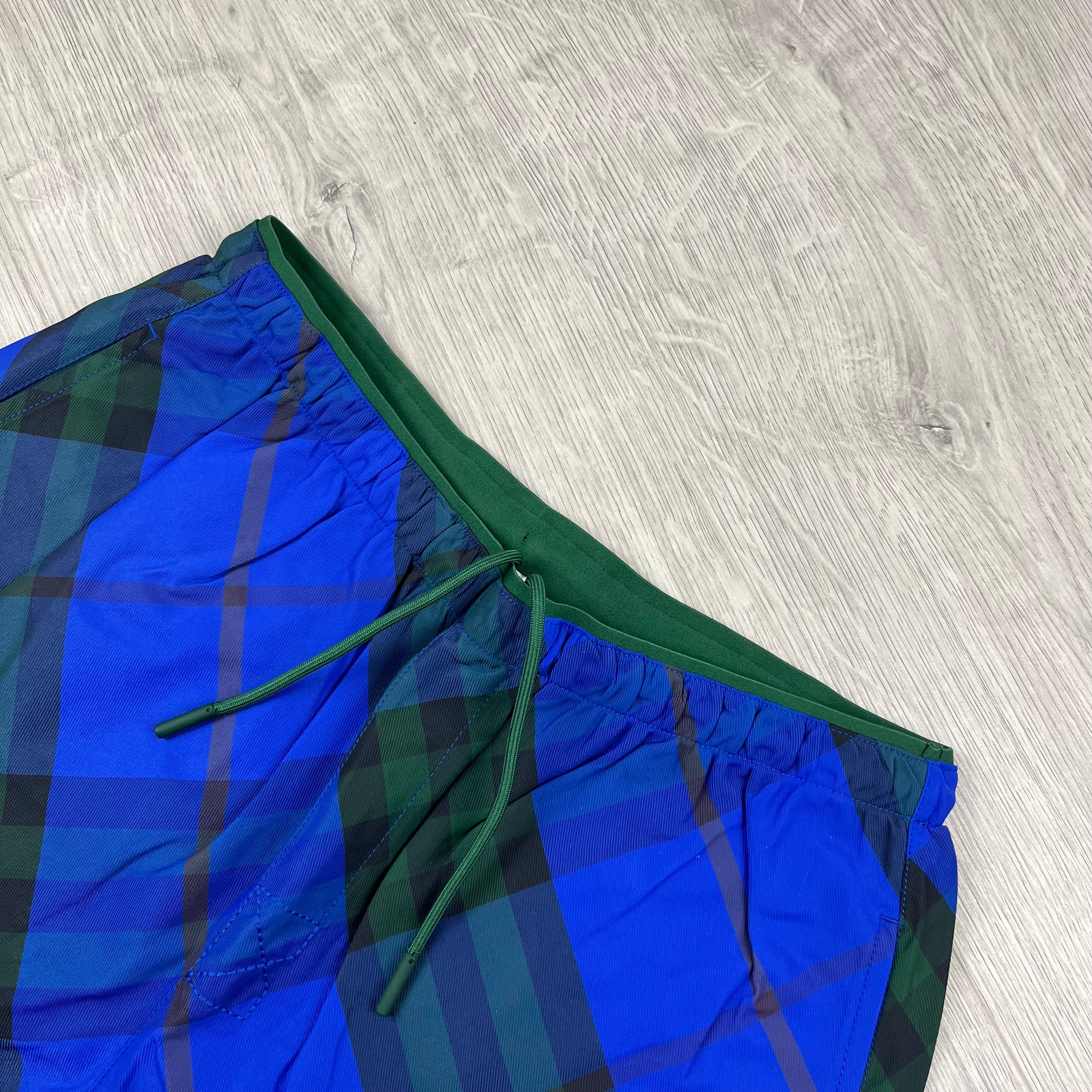 Burberry EKD Check Swim Shorts in Blue. On sale at Open Attire.