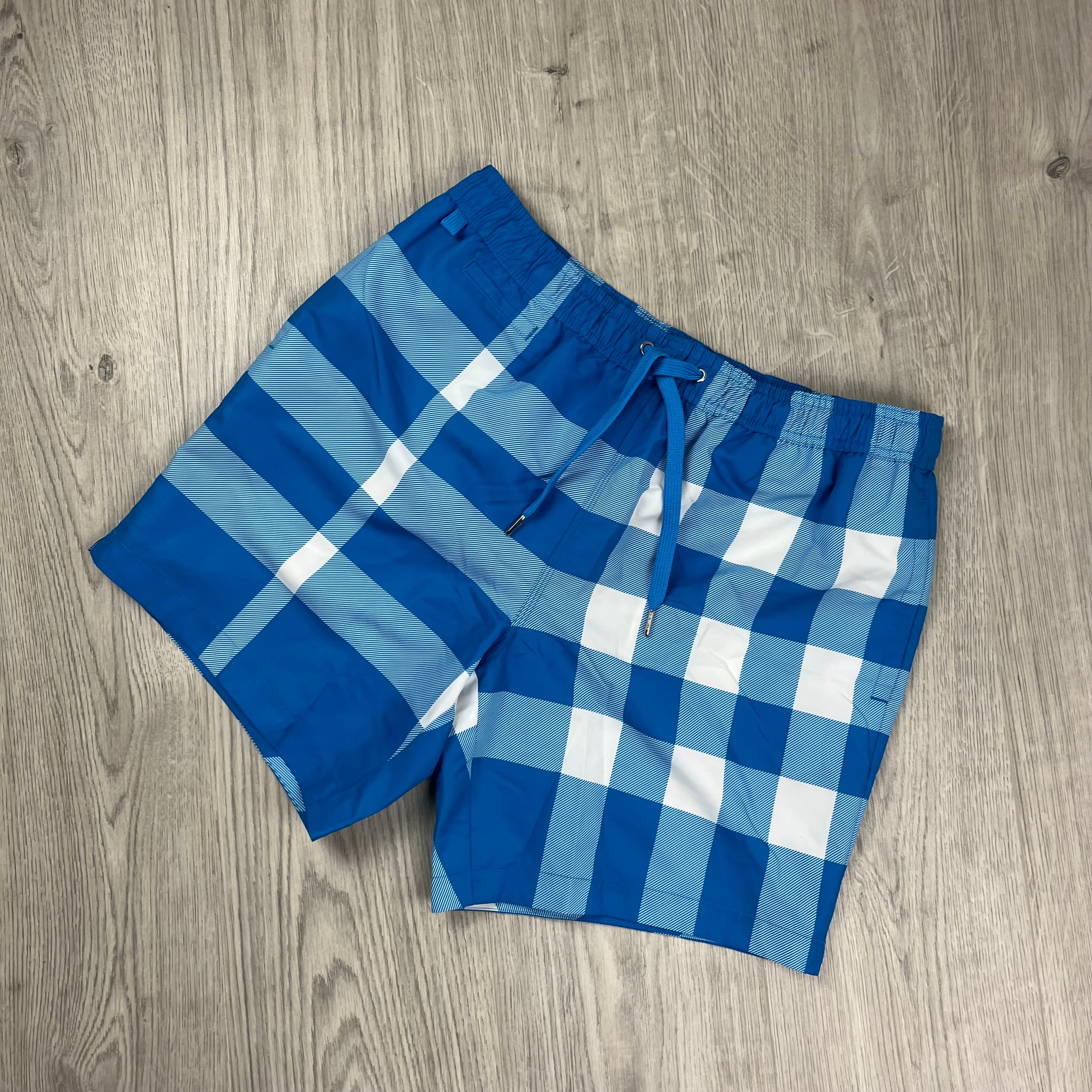 Burberry Martin Swim Shorts in Vivid Blue. On sale at Open Attire.