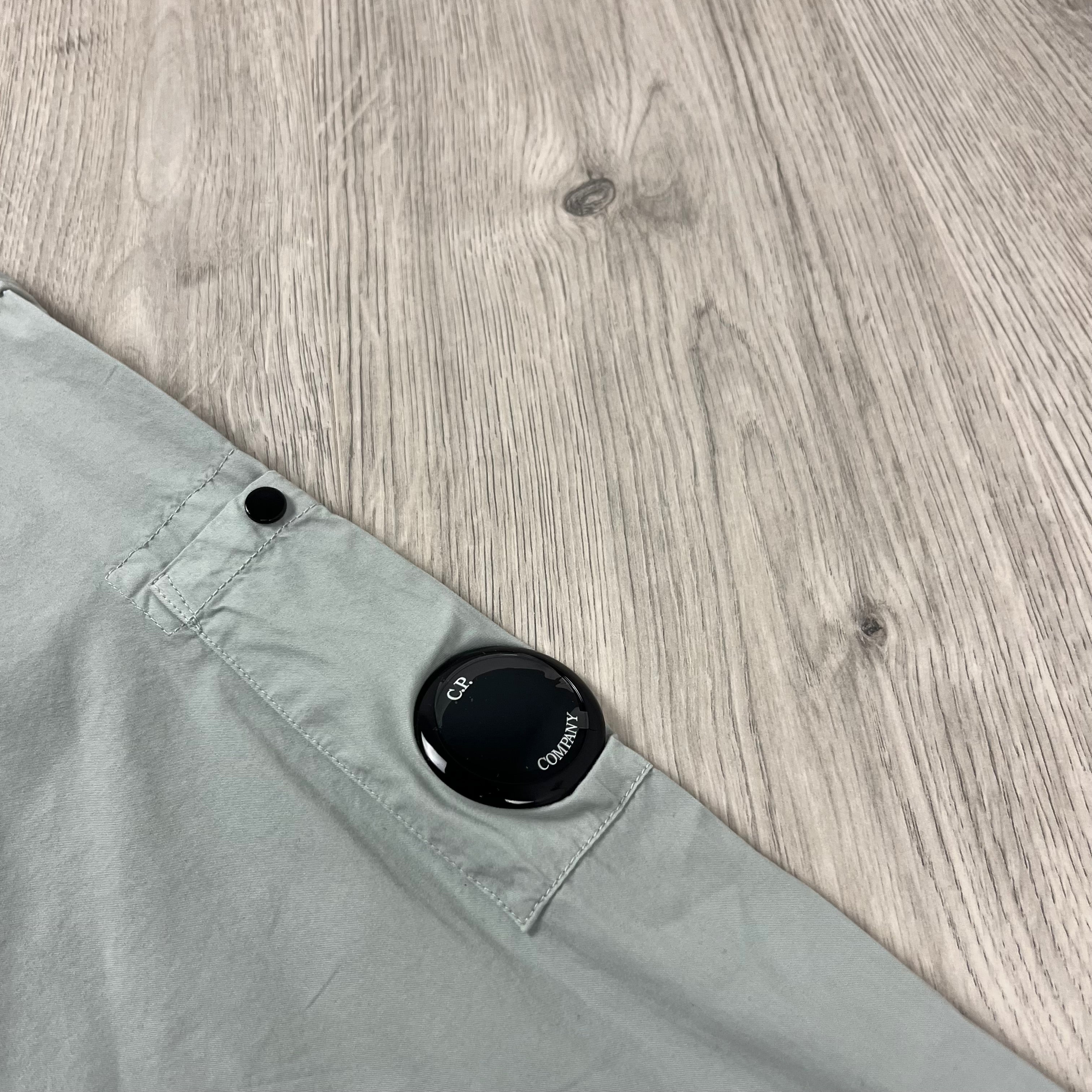 CP Company Gabardine Zip Overshirt in Blue Fox. On sale at Open Attire.