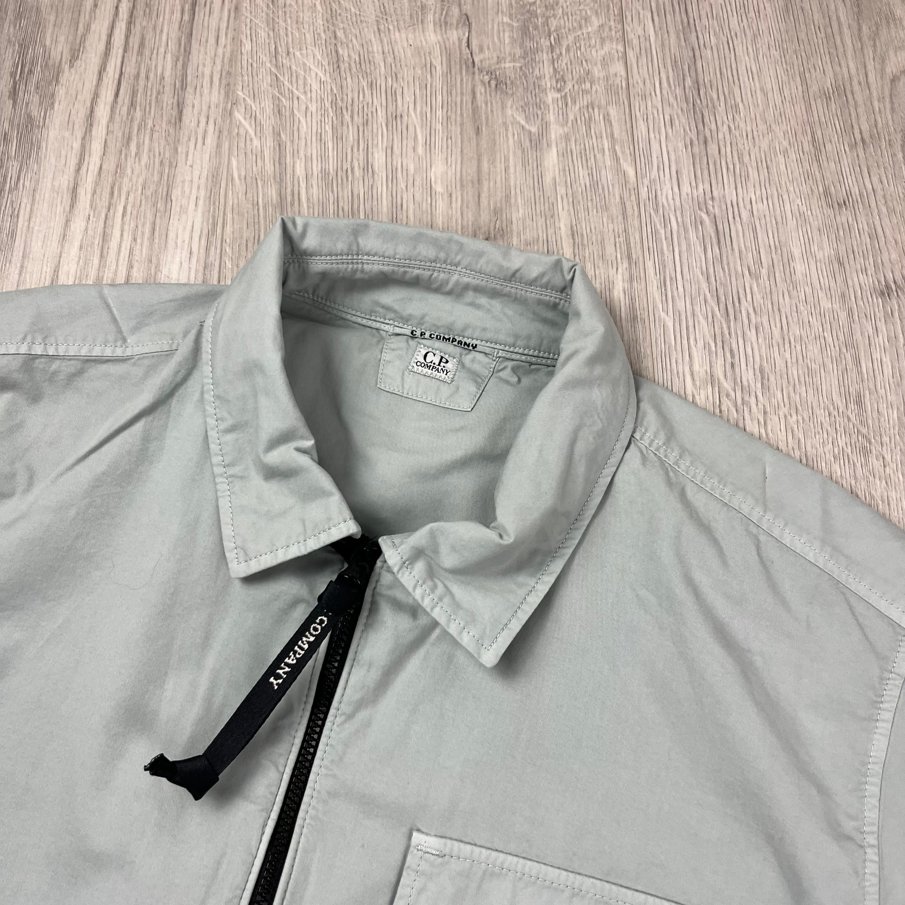 CP Company Gabardine Zip Overshirt in Blue Fox. On sale at Open Attire.