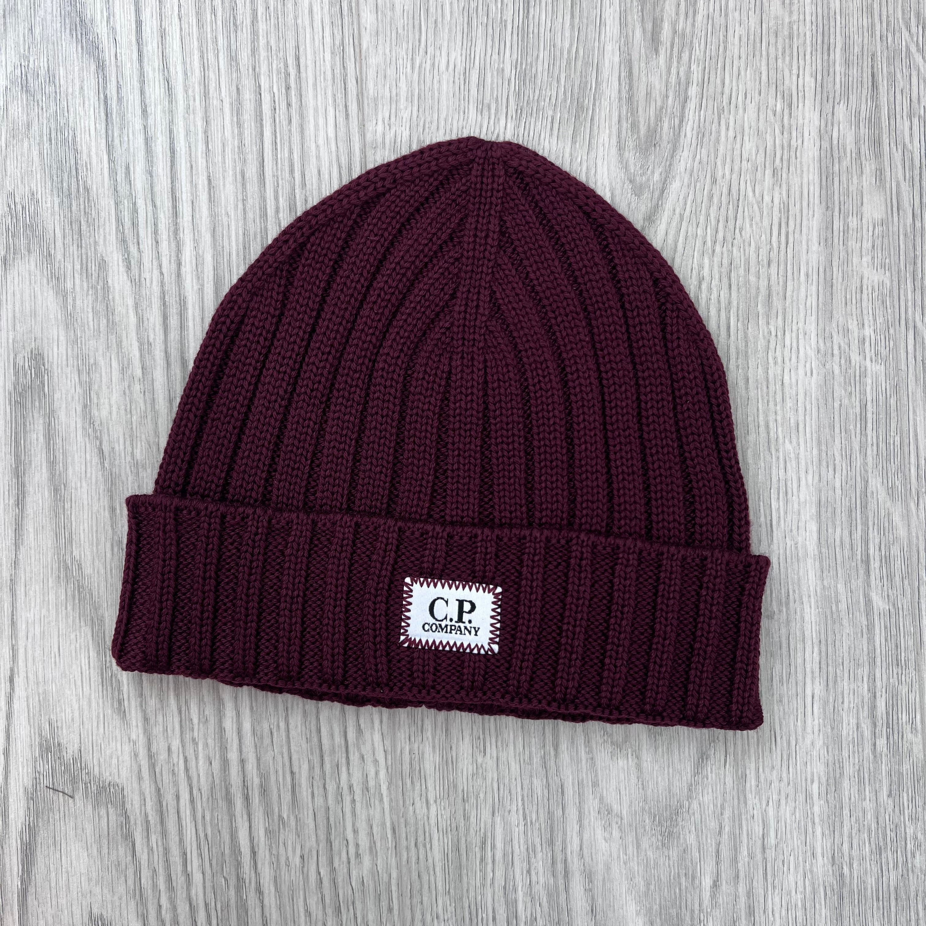 Front view of the CP Company Merino Wool Patch Beanie in Andorra.