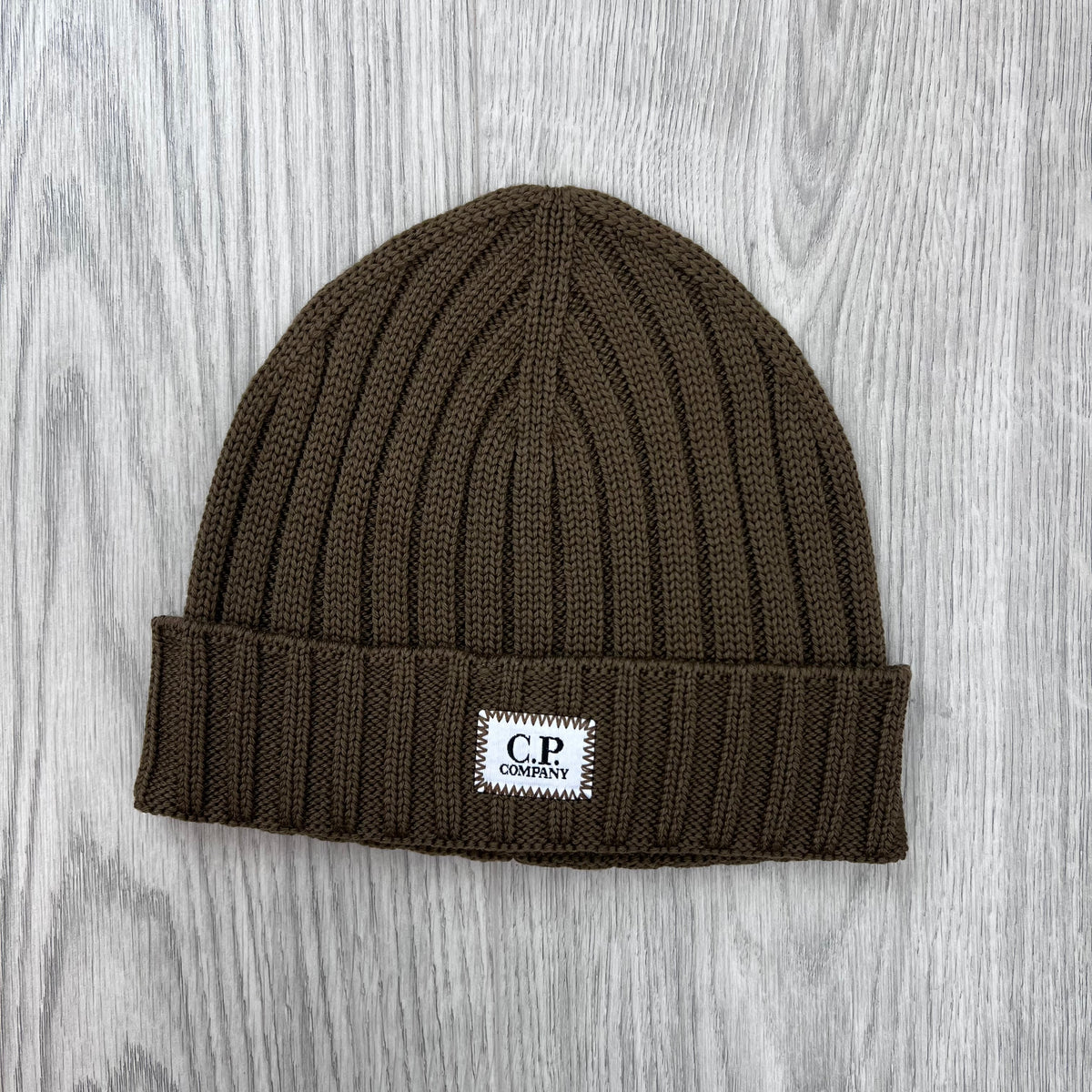Front view of the CP Company Merino Wool Patch Beanie in Ermine.