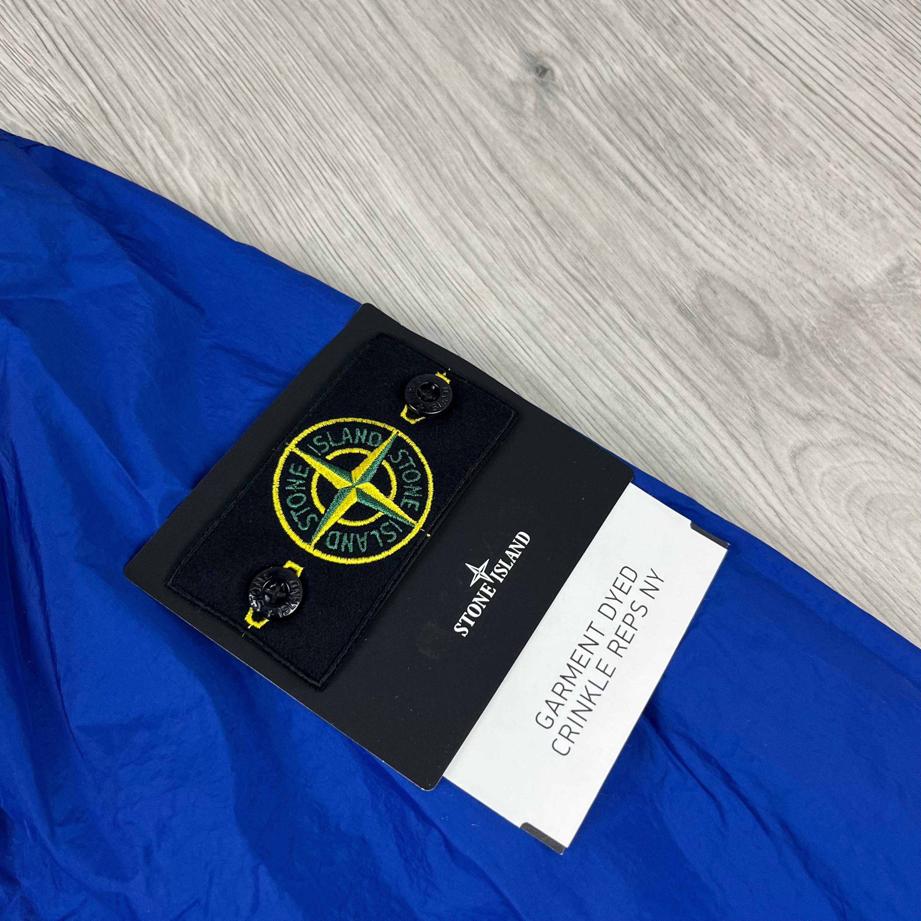 Stone Island Crinkle Reps R-NY Jacket in Bright Blue. On sale at Open Attire.